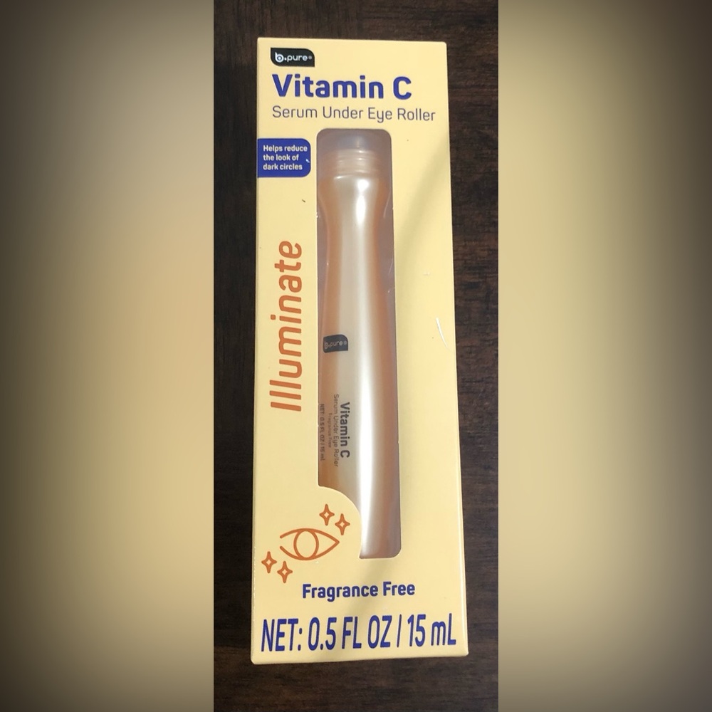 Illuminate Vitamin C Serum under the eyes roller. 0.5 Oz